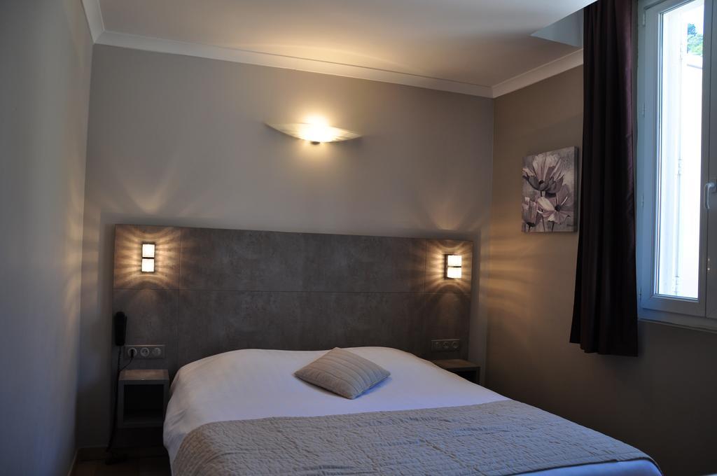 Hotel De La Plage Le Lavandou Cameră foto